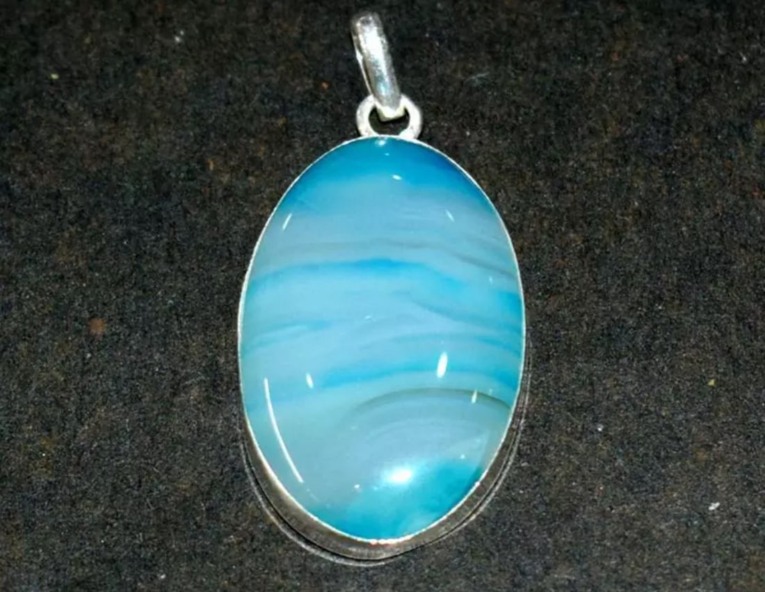 SOLID 925 STERLING SILVER PENDANT - BLUE CHALCEDONY OVAL 1 3/8": These are natural, earth mined and hand crafted with precision. Stone: Blue Chalcedony, Shape: Oval, Size: 17x28 mm, Width - 6 mm, Length: 1 3/8", Weight: approx. 30 carats. The photographs are enlarg