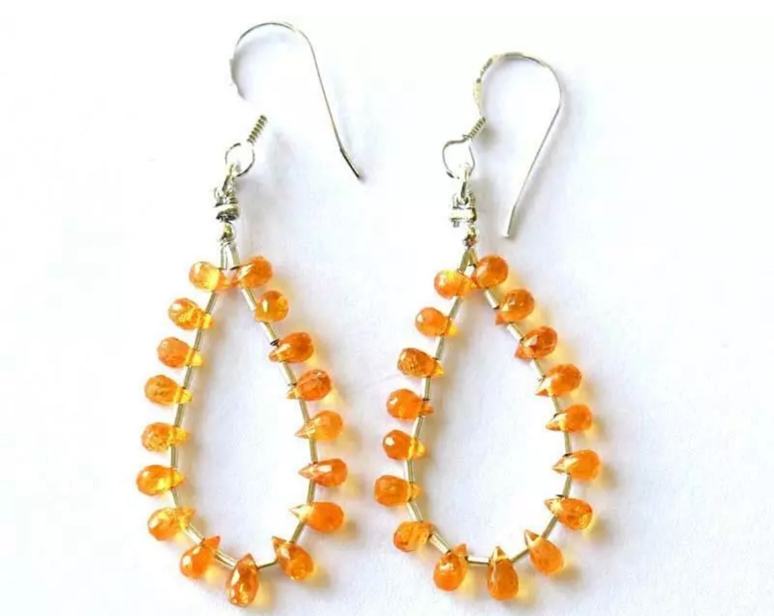 SOLID 925 STERLING SILVER EARRINGS - NATURAL SPESSARTITE GARNET BEADS: These are natural, earth mined and hand crafted with precision. Stone: Spessartite Garnet, Shape: Faceted Briolette, Size: 2.5x3.5 - 2.5x4.5 mm, Length: 2", Weight: approx. 12 carats. The photographs
