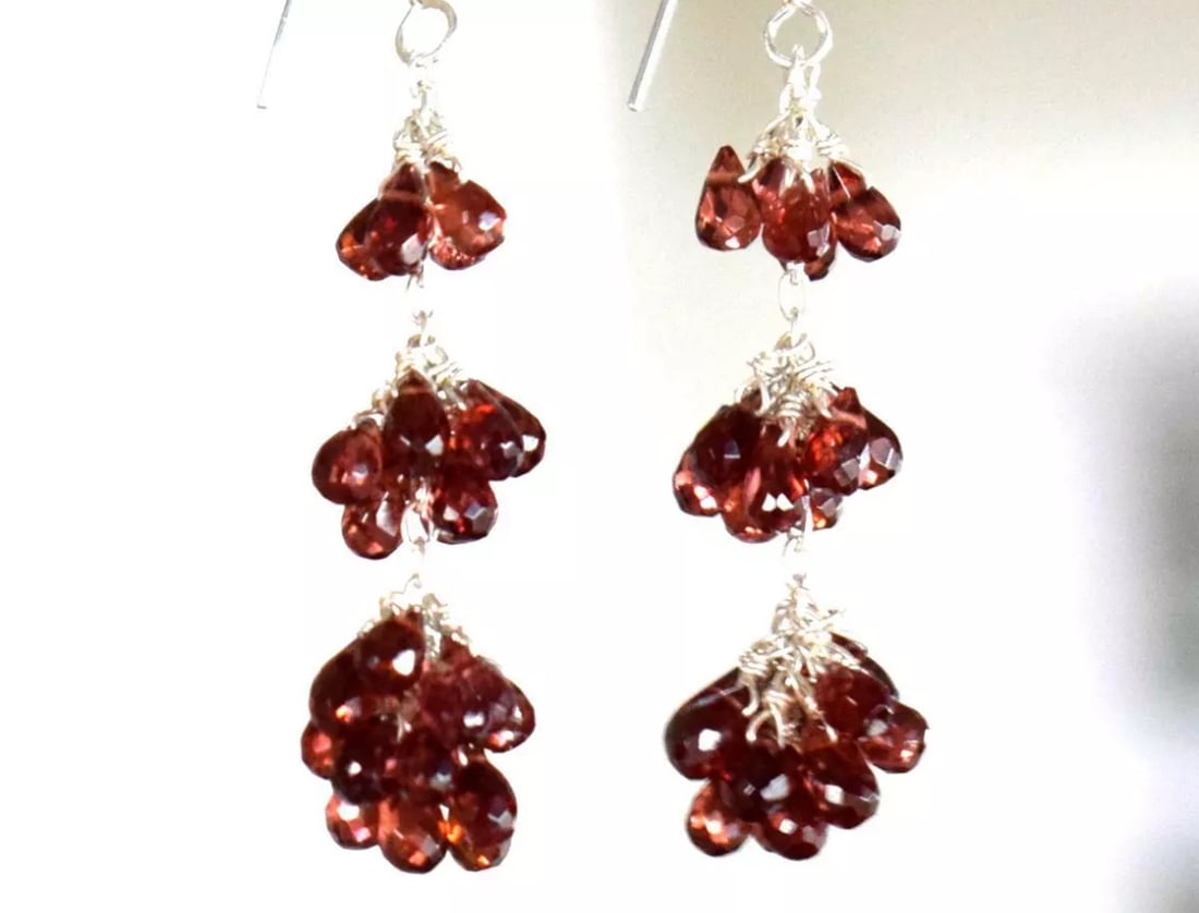 SOLID 925 STERLING SILVER EARRINGS - NATURAL GARNET BEADS: These are natural, earth mined and hand crafted with precision. Stone: Garnet, Shape: Faceted Briolette, Size: 3x5 - 3x6 mm, Length: 2 1/8", Weight: approx. 37 carats. The photographs are enlarged to