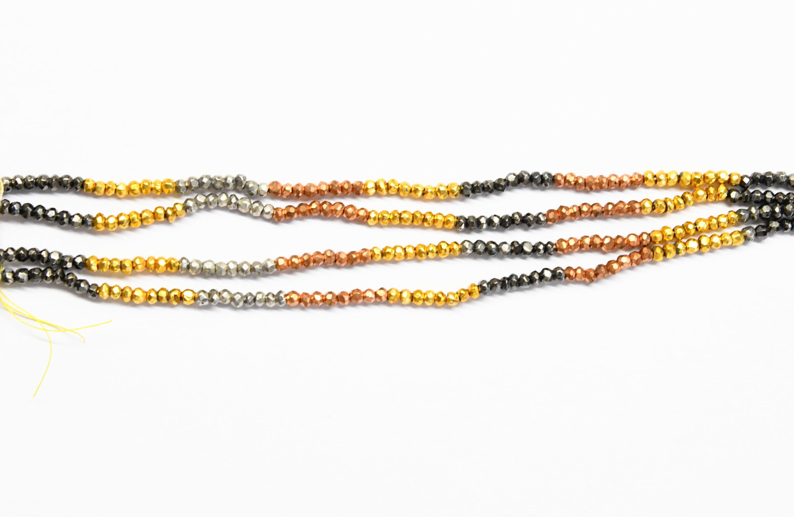 NATURAL PYRITE BEADS (COATED) FACETED RONDELLE 3.5 MM, 7" STRAND (4 LINES): These are natural, earth mined and hand crafted with precision. Stone: Pyrite, Stone Shape: Faceted Rondelle, Stone Size: 3.5 mm, Width: 1.5 - 2.5 mm, Weight: approx. 31 carats. The photographs are ge