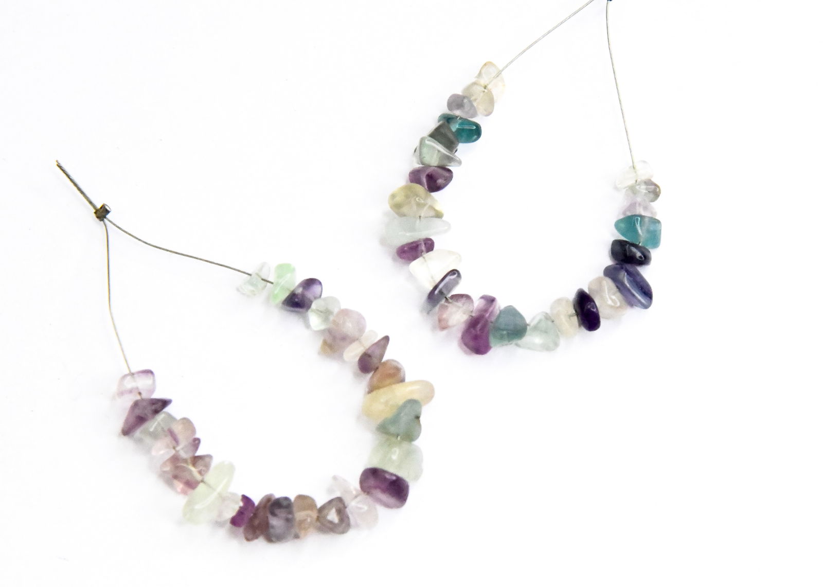 NATURAL MULTI FLUORITE BEADS CHIPS 3X4.5 - 5X7 MM, 25 PCS (7 TASSELS): These are natural, earth mined and hand crafted with precision. Stone: Multi Fluorite, Stone Shape: Chips, Stone Size: 3x4.5 - 5x7 mm, Width: 2 - 3.5 mm, Weight: approx. 17.50 cts. The photographs are