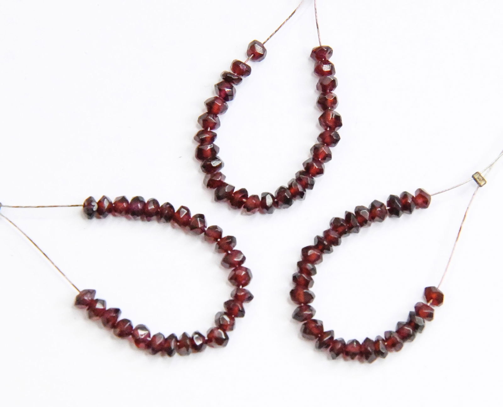 NATURAL GARNET BEADS FACETED RONDELLE 3.5 - 4 MM, 25 PCS (3 TASSELS): These are natural, earth mined and hand crafted with precision. Stone: Garnet, Stone Shape: Faceted Rondelle, Stone Size: 3.5 - 4 mm, Width: 1.5 - 2 mm, Weight: approx. 9 cts. The photographs are enla