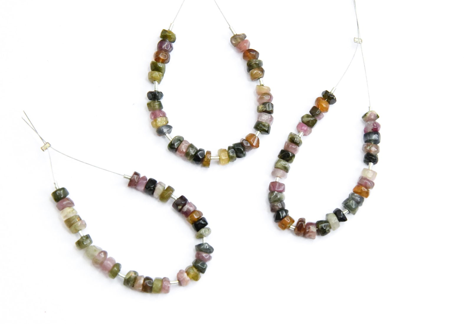 NATURAL MULTI TOURMALINE BEADS FACETED RONDELLE 4 MM, 30 PCS (10 TASSELS): These are natural, earth mined and hand crafted with precision. Stone: Multi Tourmaline, Stone Shape: Faceted Rondelle, Stone Size: 4 mm, Width: 2 - 2.5 mm, Weight: approx. 11 cts. The photographs are