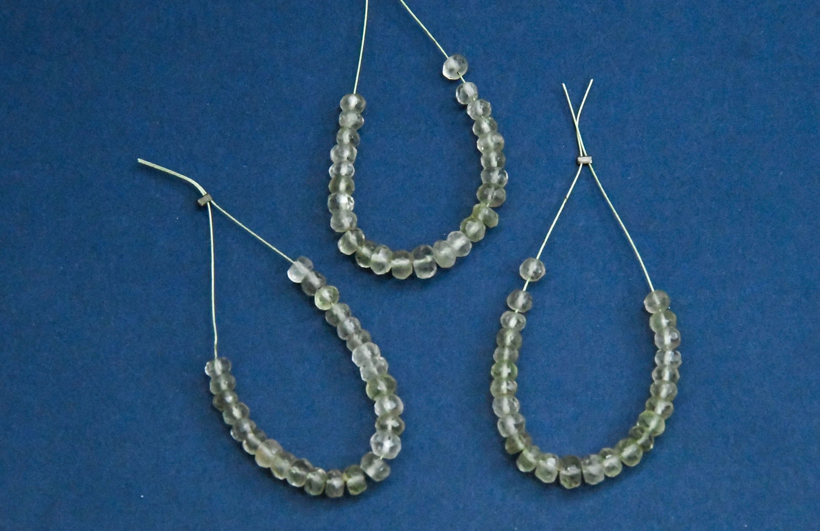 NATURAL LEMON QUARTZ BEADS FACETED RONDELLE 3.5 - 4.5 MM 25 PCS (10 TASSELS): These are natural, earth mined and hand crafted with precision. Stone: Lemon Quartz, Stone Shape: Faceted Rondelle, Stone Size: 3.5 - 4.5 mm Width: 2 - 3 mm, Weight: approx. 9 carats. The photographs