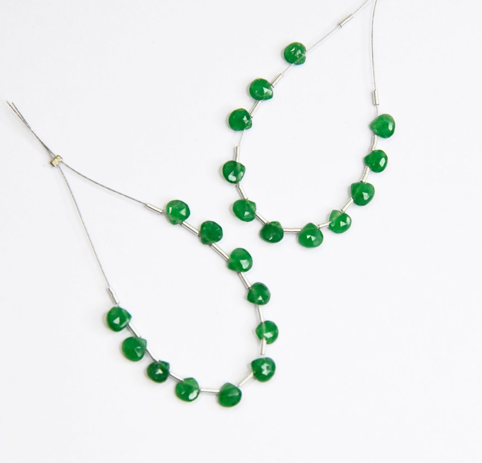 NATURAL GREEN QUARTZ BEADS FACETED HEART 4.5 - 5 MM, 11 PCS (3 TASSELS): These are natural, earth mined and hand crafted with precision. Stone: Green Quartz, Stone Shape: Faceted Heart, Stone Size: 4.5 - 5 mm, Weight: approx. 3.70 carats. The photographs are enlarged to sh