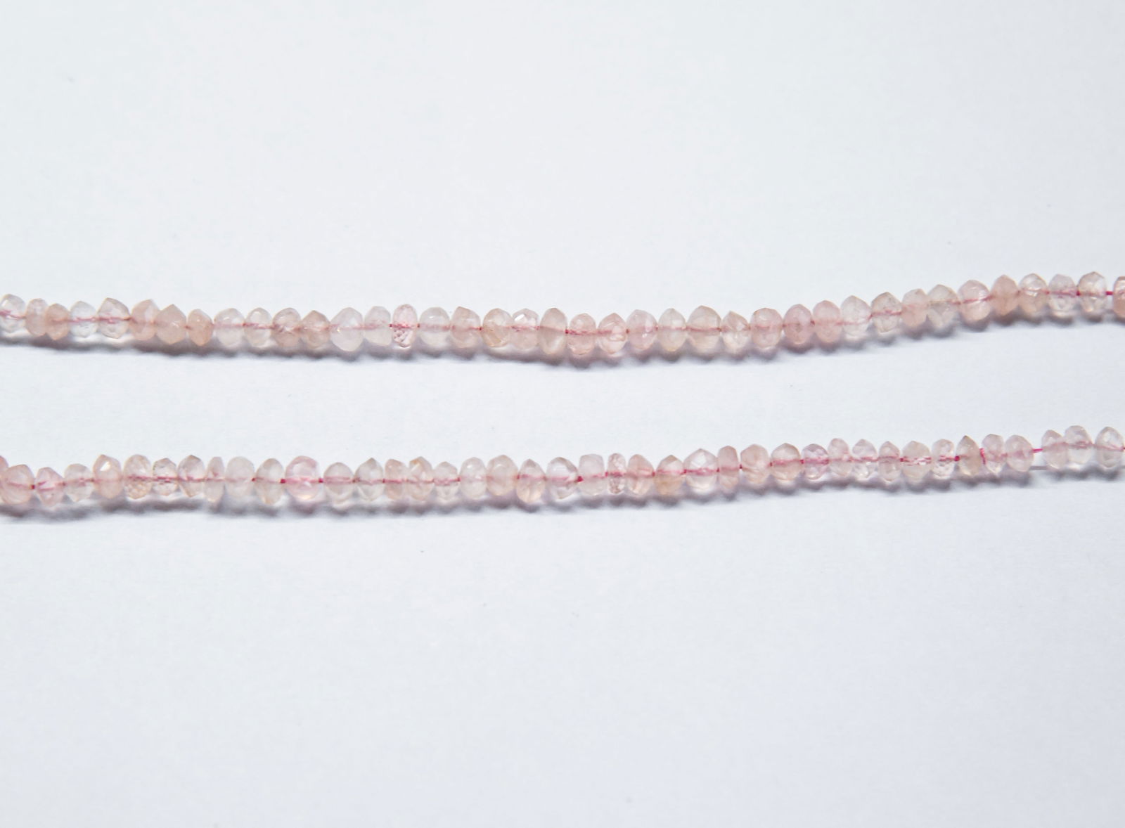 NATURAL ROSE QUARTZ BEADS FACETED RONDELLE 5 - 5.5 MM, 9.5" STRAND (2 LINES) (1 of 1)