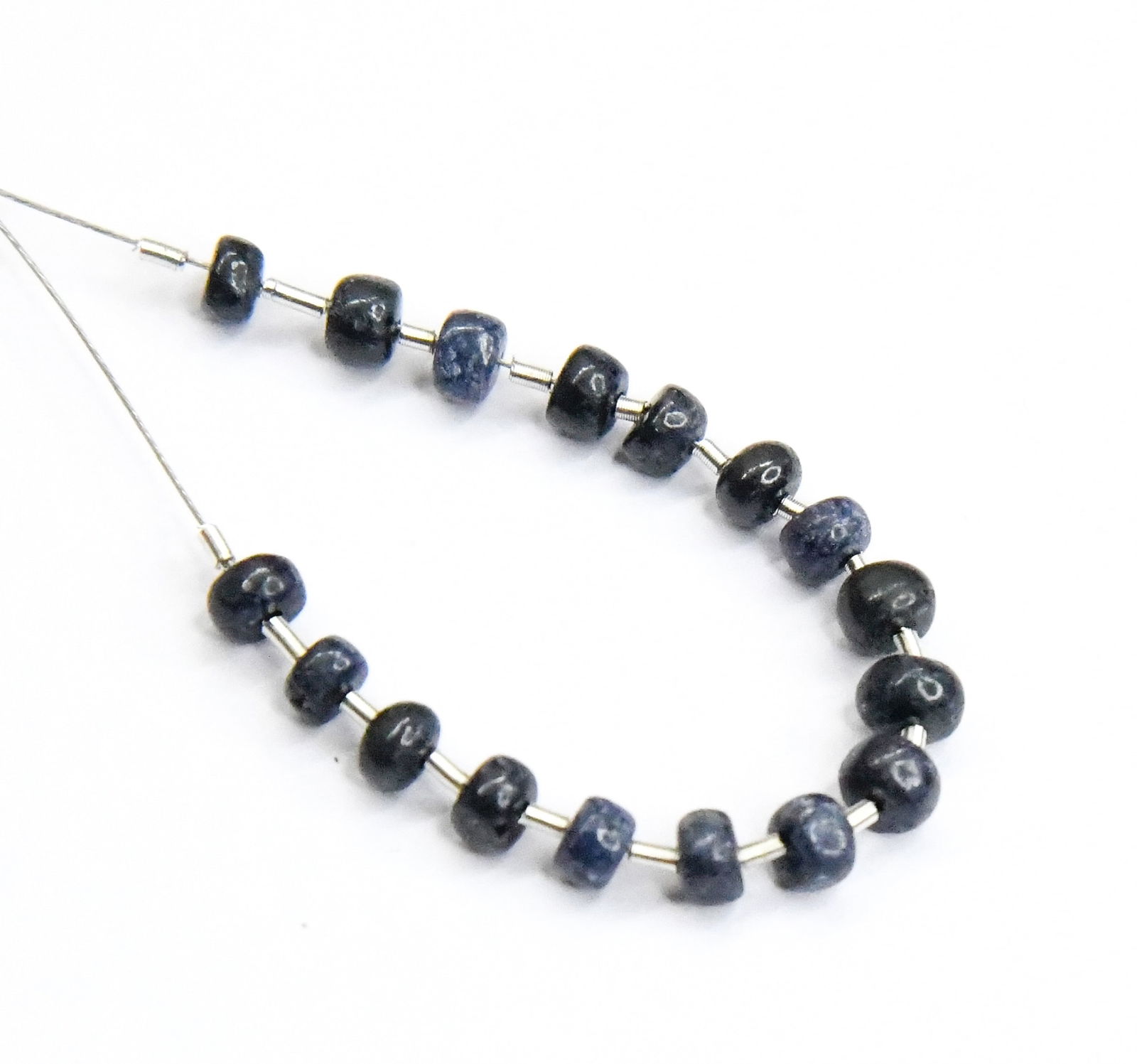 NATURAL BLUE SAPPHIRE BEADS (DYED) RONDELLE 4 - 5 MM 17 PCS (3 TASSELS): These are natural, earth mined and hand crafted with precision. Stone: Blue Sapphire, Stone Shape: Rondelle, Stone Size: 4 - 5 mm, Width: 2.5 - 3 mm, Weight: approx. 10 carats. The photographs are enl