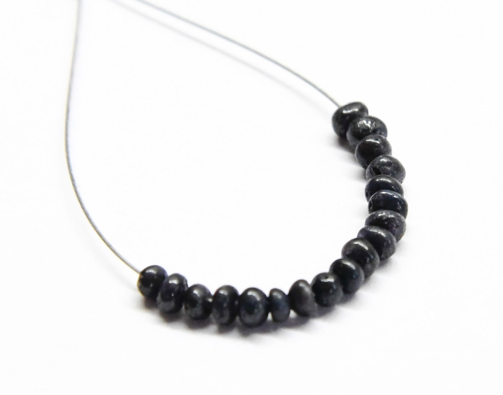 NATURAL SAPPHIRE BEADS RONDELLE 2.5 MM, 18 PCS: These are natural, earth mined and hand crafted with precision. Stone: Sapphire, Stone Shape: Rondelle, Stone Size: 2.5 mm, Width: 1.5 - 2 mm, Weight: approx. 2.5 carats. The photographs are generally