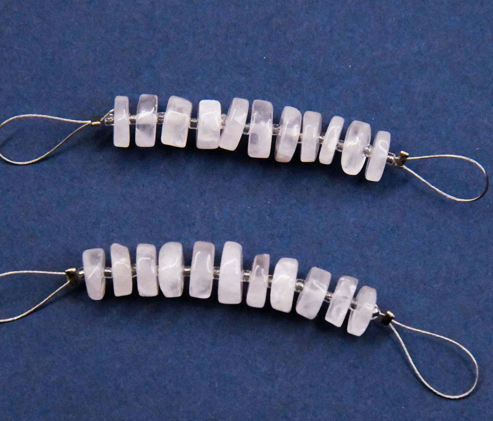 NATURAL ROSE QUARTZ BEADS TYRE 7 - 7.5 MM 11 PCS (4 TASSELS): These are natural, earth mined and hand crafted with precision. Stone: Rose Quartz, Stone Shape: Tyre, Stone Size: 7 - 7.5 mm, Width: 2 - 3 mm, Weight: approx. 12.50 carats. The photographs are enlarg