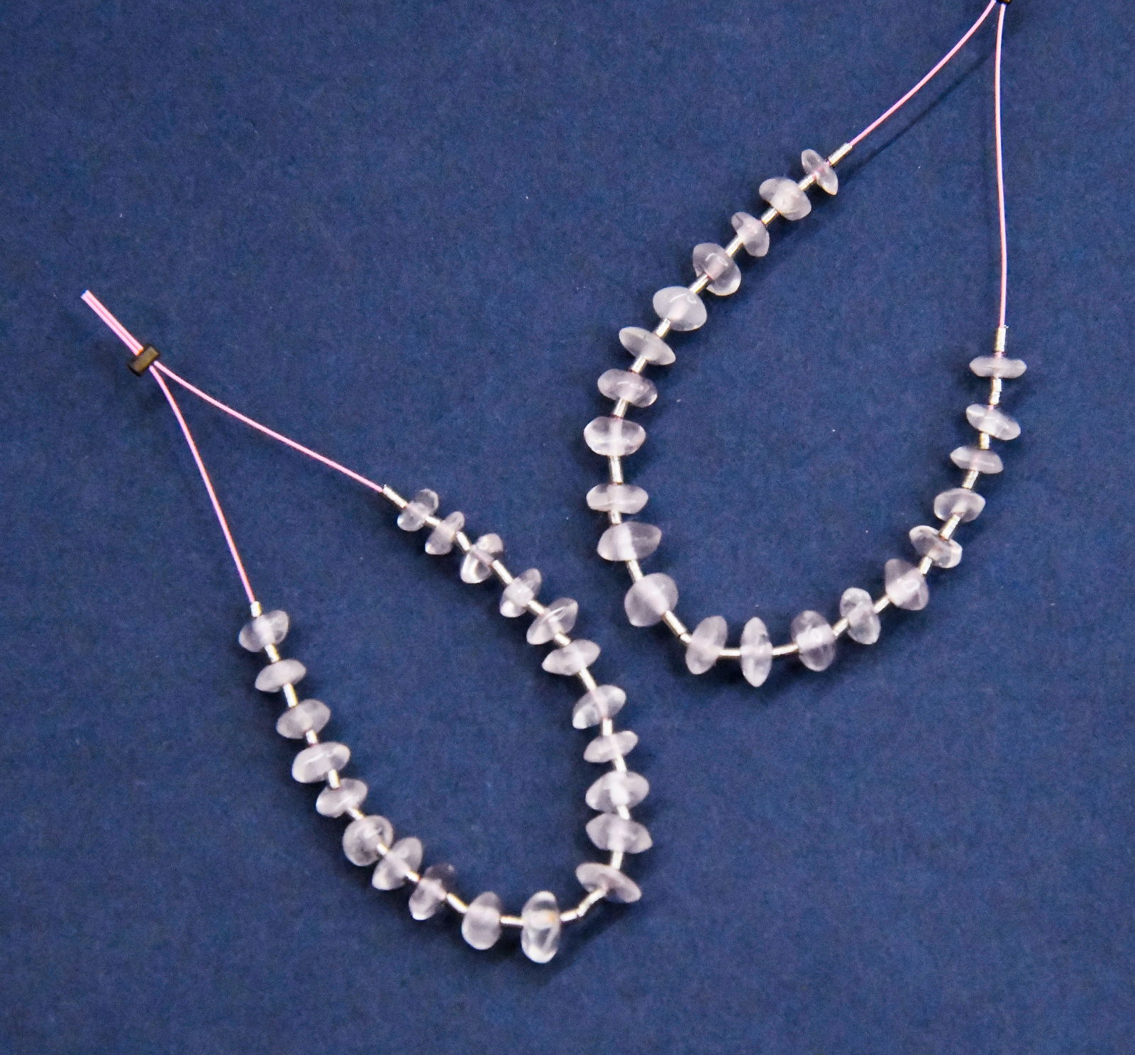 NATURAL ROSE QUARTZ BEADS RONDELLE 4 - 4.5 MM 21 PCS (4 TASSELS): These are natural, earth mined and hand crafted with precision. Stone: Rose Quartz, Stone Shape: Rondelle, Stone Size: 4 - 4.5 mm, Width: 1.5 - 3 mm, Weight: approx. 6 carats. The photographs are enla