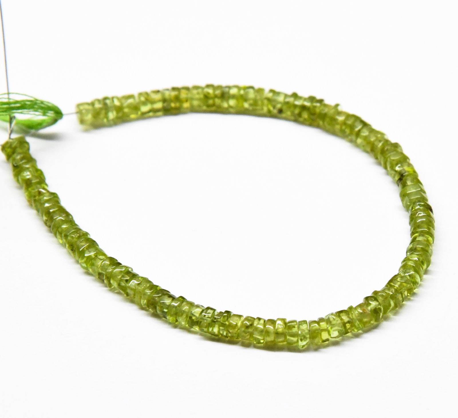 NATURAL PERIDOT BEADS TYRE 4 MM, 7" LINE (1 of 2)