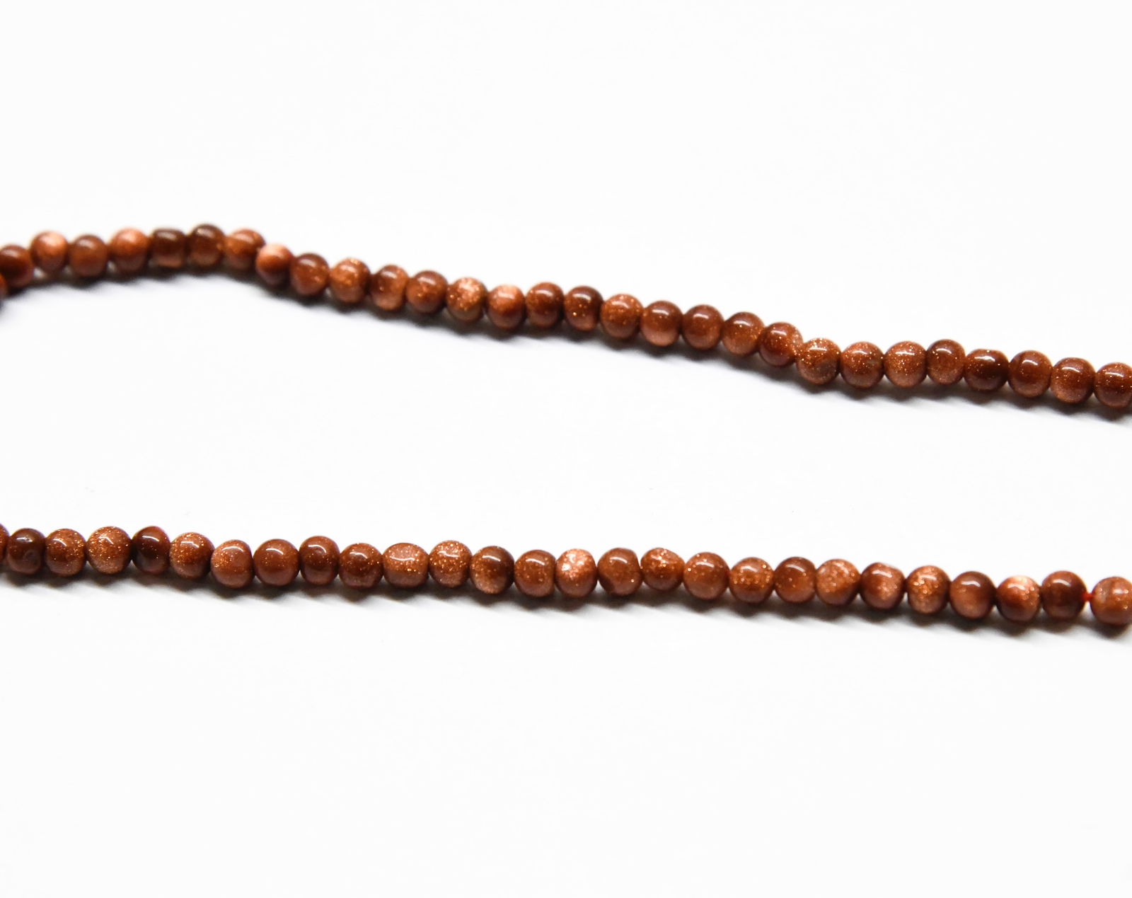 NATURAL GOLDSTONE BEADS ROUND 3.5 - 4 MM, 9.5" STRAND (1 of 1)