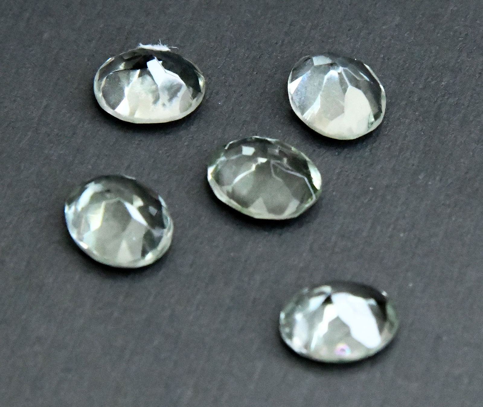 NATURAL GREEN AMETHYST BEADS FACETED OVAL 9X11 MM - (6 PIECES): These are natural, earth mined and hand crafted with precision. Stone: Green Amethyst, Stone Shape: Faceted Oval, Stone Size: 9x11 mm, Width: 4.5 - 6 mm, Weight: approx. 18 carats. The photographs are