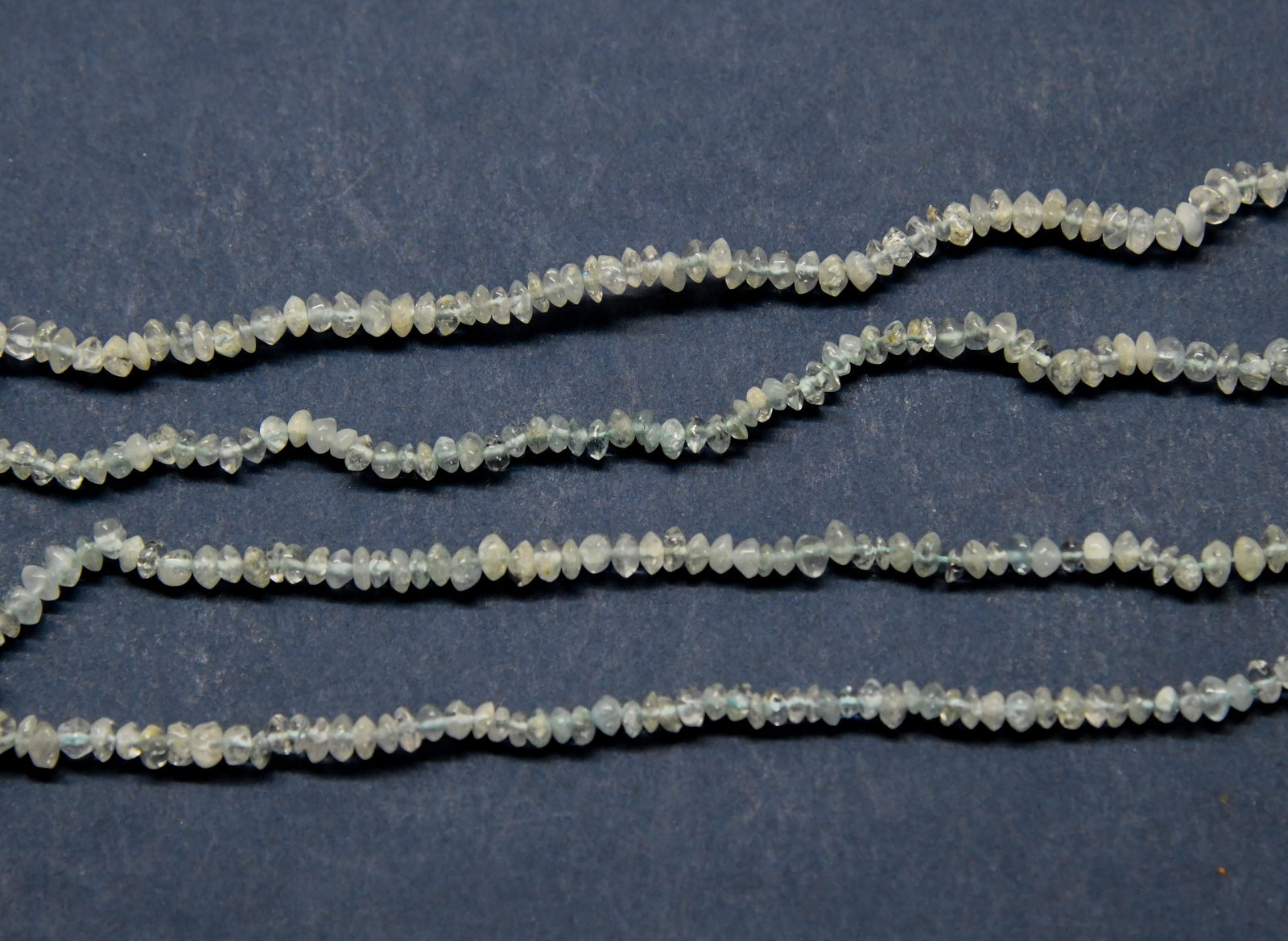 NATURAL AQUAMARINE BEADS RONDELLE 2.5 - 3.5 MM, 12.5" STRAND: These are natural, earth mined and hand crafted with precision. Stone: Aquamarine, Stone Shape: Rondelle, Stone Size: 2.5 - 3.5 mm, Width: 1 - 2 mm, Weight: approx. 26 carats. The photographs are gene