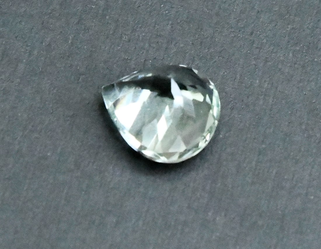 NATURAL GREEN AMETHYST BEADS FACETED HEART 14.5X 15 MM - (1 PIECES): These are natural, earth mined and hand crafted with precision. Stone: Green Amethyst, Stone Shape: Faceted Heart, Stone Size: 14.5x15 mm, Width: 9.5 mm, Weight: approx. 9.90 carats. The photographs a