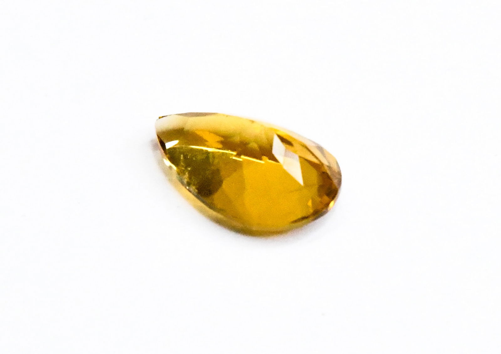 NATURAL CITRINE BEAD FACETED PEAR 12.5X20 MM (1 PIECES): These are natural, earth mined and hand crafted with precision. Stone: Citrine, Stone Shape: Faceted Pear, Stone Size: 12.5x20 mm, Width: 8.5 mm, Weight: approx. 11 carats. The photographs are enlarge