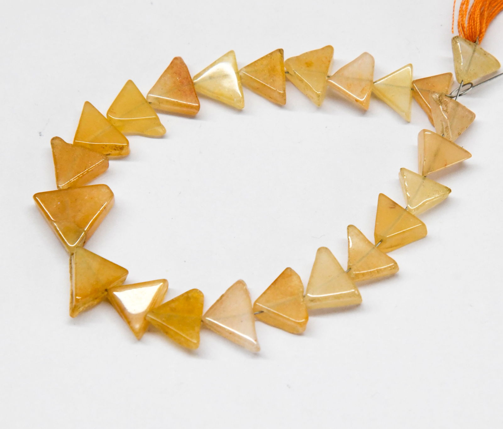 NATURAL YELLOW AVENTURINE BEADS TRIANGLE 6X9 - 11X12 MM, 6.5" STRAND (1 of 1)