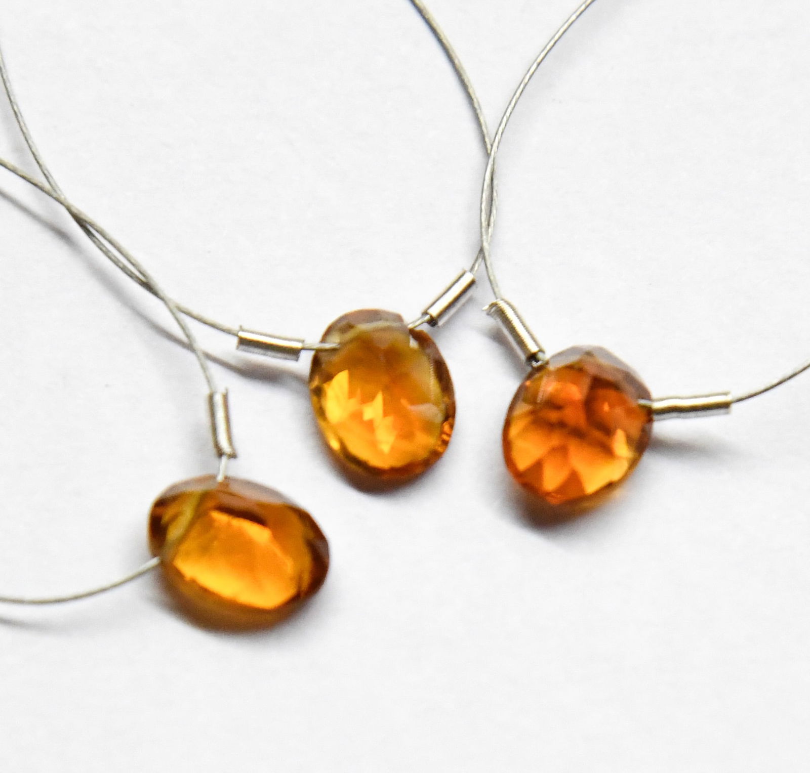 NATURAL CITRINE BEADS FACETED OVAL 6X8 MM 3 PCS: These are natural, earth mined and hand crafted with precision. Stone: Citrine, Shape: Faceted Oval, Size: 6x8 mm, Width: 3.5 - 5 mm, Weight: approx. 3.5 carats. The photographs are enlarged to show t
