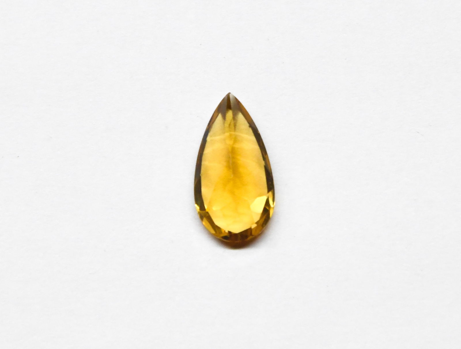NATURAL CITRINE BEADS CUTSTONE PEAR 11X20 MM 1 PIECE: These are natural, earth mined and hand crafted with precision. Stone: Citrine, Shape: Faceted Pear, Size: 11x20.25 mm, Width: 8 mm, Weight: approx. 9 carats. The photographs are enlarged to show the