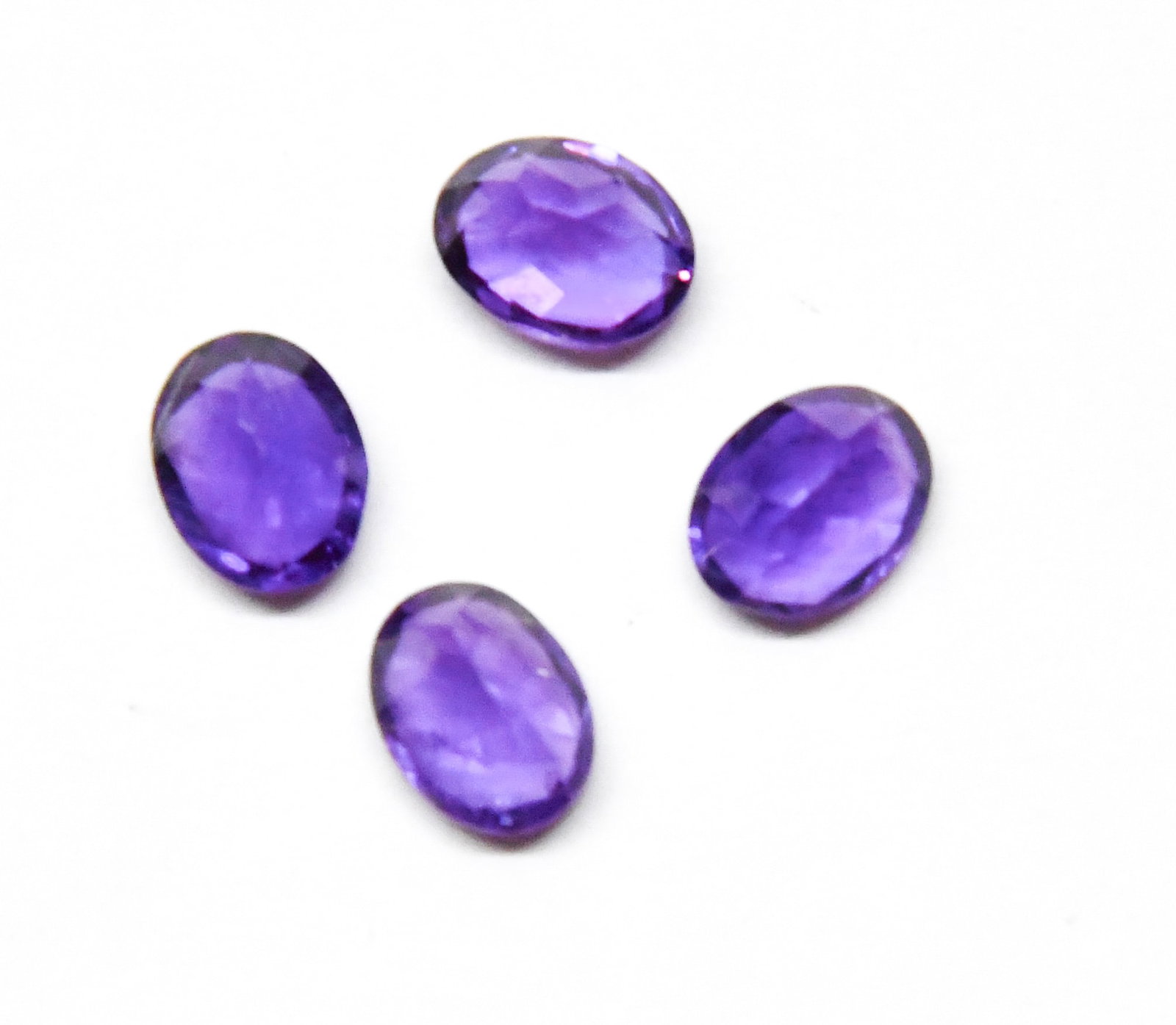 NATURAL AMETHYST FACETED CUTSTONE OVAL 7X9 MM 4 PCS (1 of 2)
