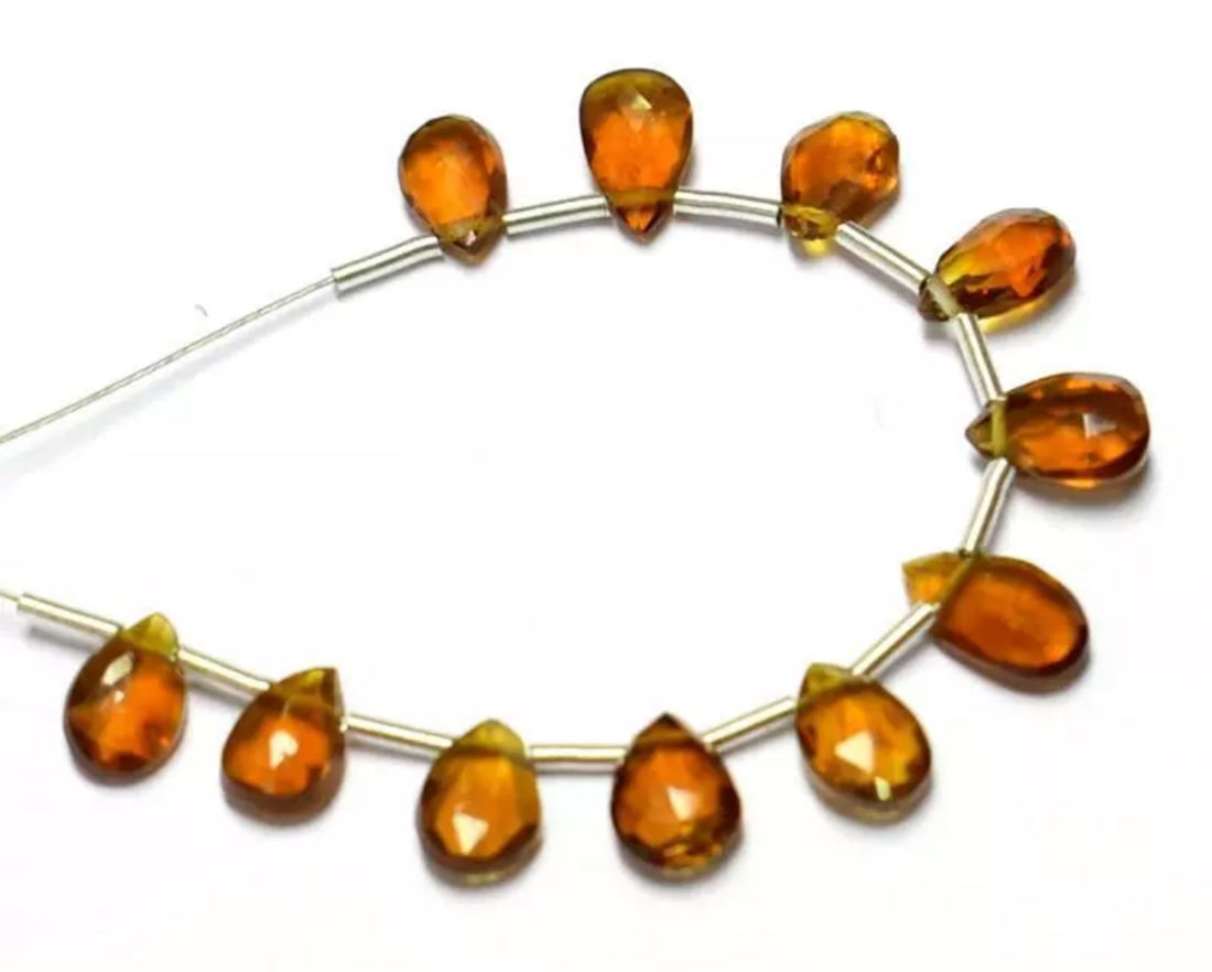 NATURAL GOLDEN CITRINE BEADS FACETED PEAR 4X6 - 4.5X8 MM 11 PCS (2 TASSELS): These are natural, earth mined and hand crafted with precision. Stone: Golden Citrine, Shape: Faceted Pear, Size: 4x6 - 4.5x8 mm, Width - 2.5 - 3 mm, Weight: approx. 7 carats. The photographs are enla