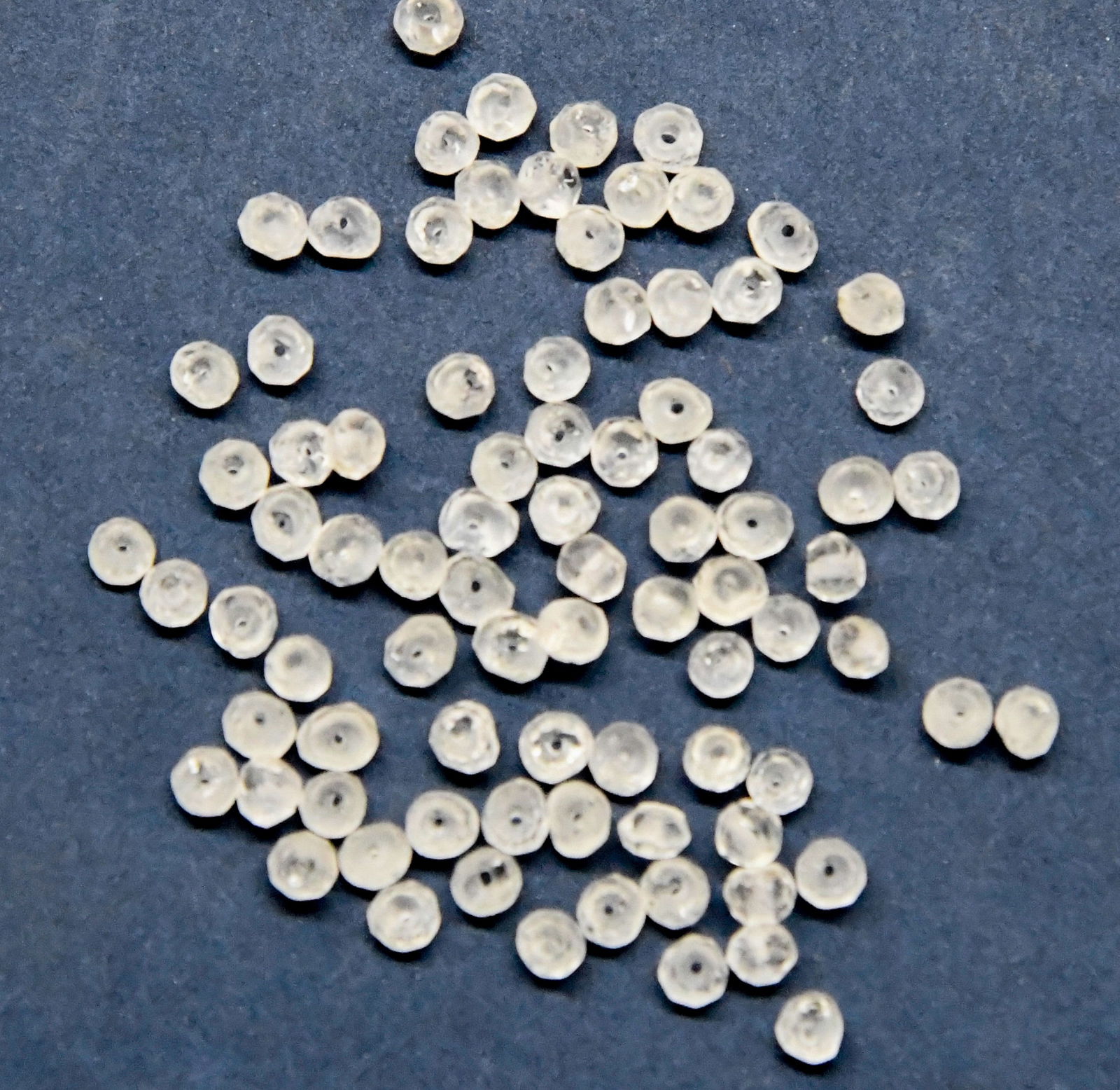 (100 PIECES) NATURAL CRYSTAL BEADS FACETED RONDELLE 3 MM: These are natural, earth mined and hand crafted with precision. Stone: Crystal, Shape: Faceted Rondelle, Size: 3 mm, Width: 1.5 - 2 mm, Weight: approx. 14 carats. The photographs are enlarged to show