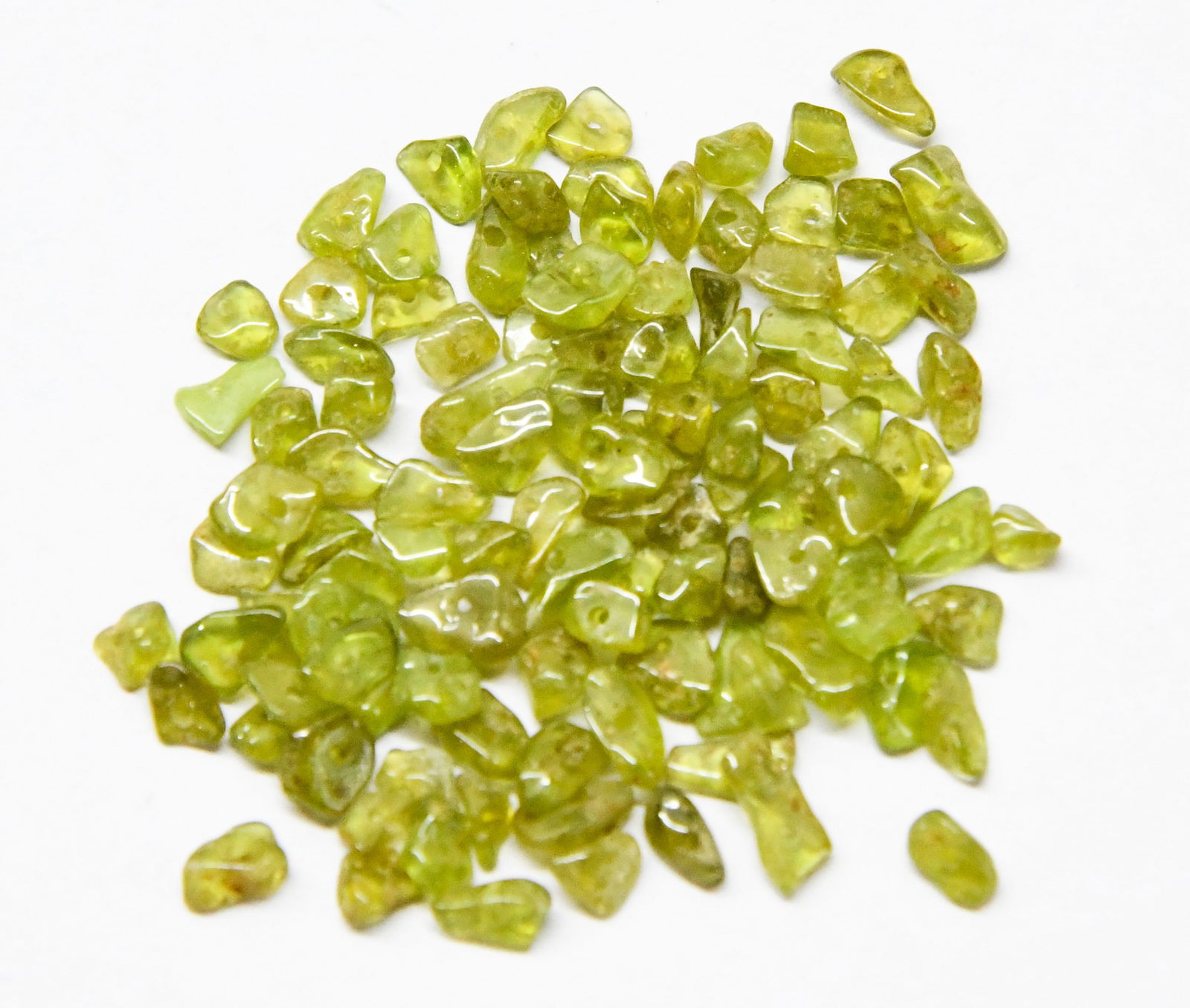(100 PIECES) NATURAL VESUVIANITE BEADS CHIPS 3X4 - 3X6 MM (4 BAGS): These are natural, earth mined and hand crafted with precision. Stone: Vessuvianite, Shape: Chips, Size: 3x4 - 3x6 mm, Width: 1.5 - 2 mm, Weight: approx. 30 carats. The photographs are enlarged to sho