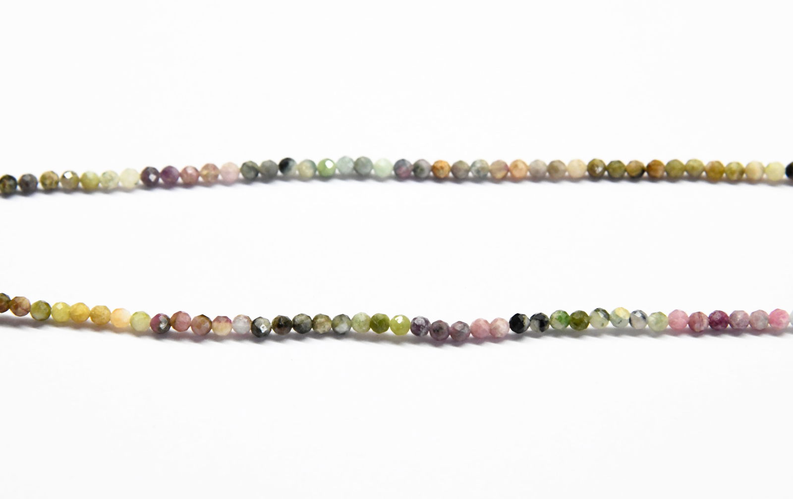 16" STRAND NATURAL MULTI TOURMALINE BEADS FACETED ROUND 3.5 MM: These are natural, earth mined and hand crafted with precision. Stone: Multi Tourmaline, Shape: Faceted Round, Size: 3.5 mm, Weight: approx. 33 carats. The photographs are enlarged to show the clarity