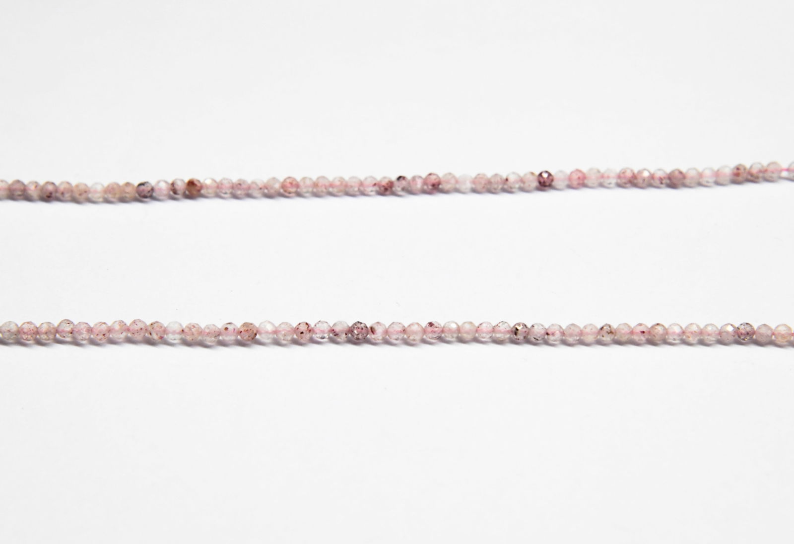 16" STRAND NATURAL STRAWBERRY QUARTZ BEADS FACETED ROUND 3 MM: These are natural, earth mined and hand crafted with precision. Stone: Strawberry Quartz, Stone Shape: Faceted Round, Stone Size: 3 mm, Length: 16", Weight: approx. 24 carats. The photographs are enla