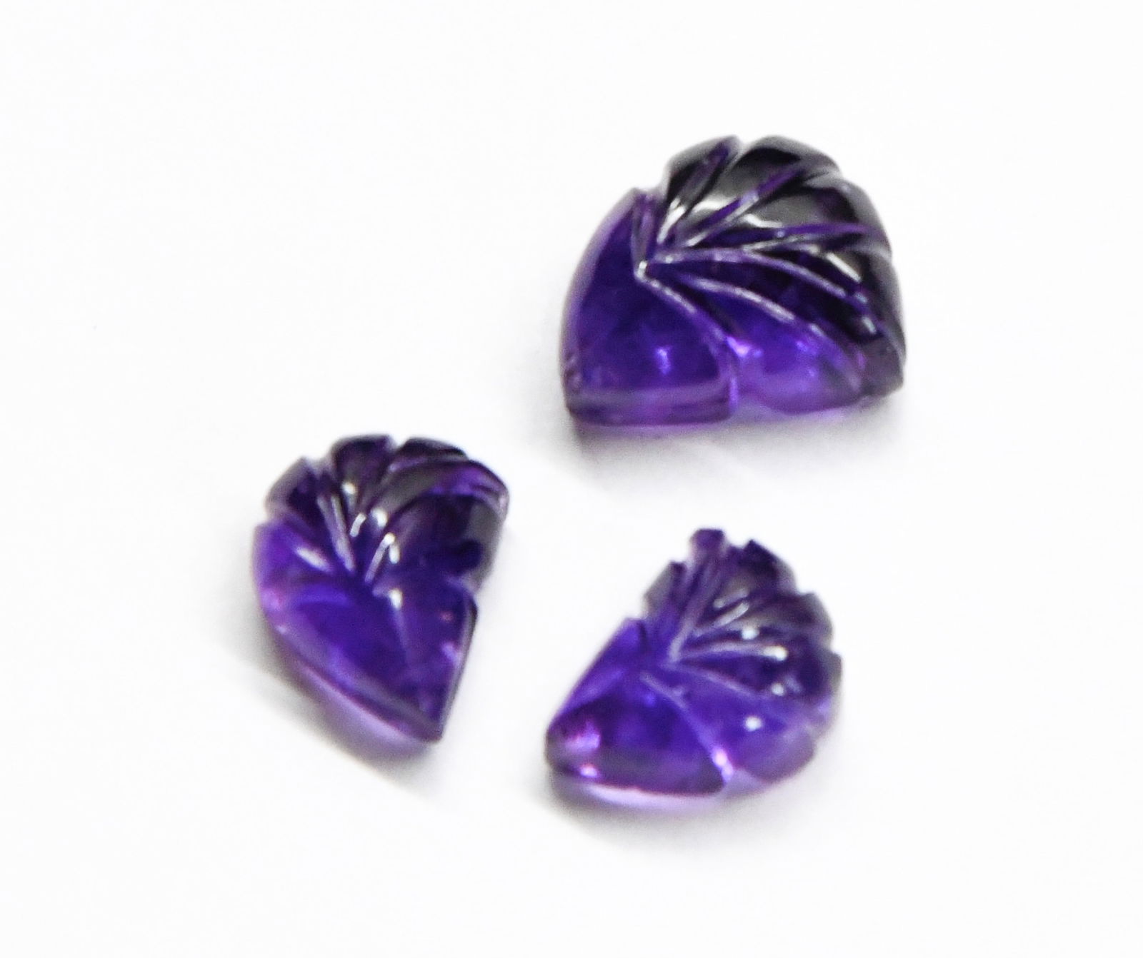 NATURAL AMETHYST BEADS CARVED FANCY 10X14 - 12X15MM (3 PCS): These are natural, earth mined and hand crafted with precision. Stone: Amethyst, Stone Shape: Carved Fancy, Stone Size: 10x14 - 12x15.5 mm, Width: 7 - 9 mm, Weight: approx. 28 carats. The photographs