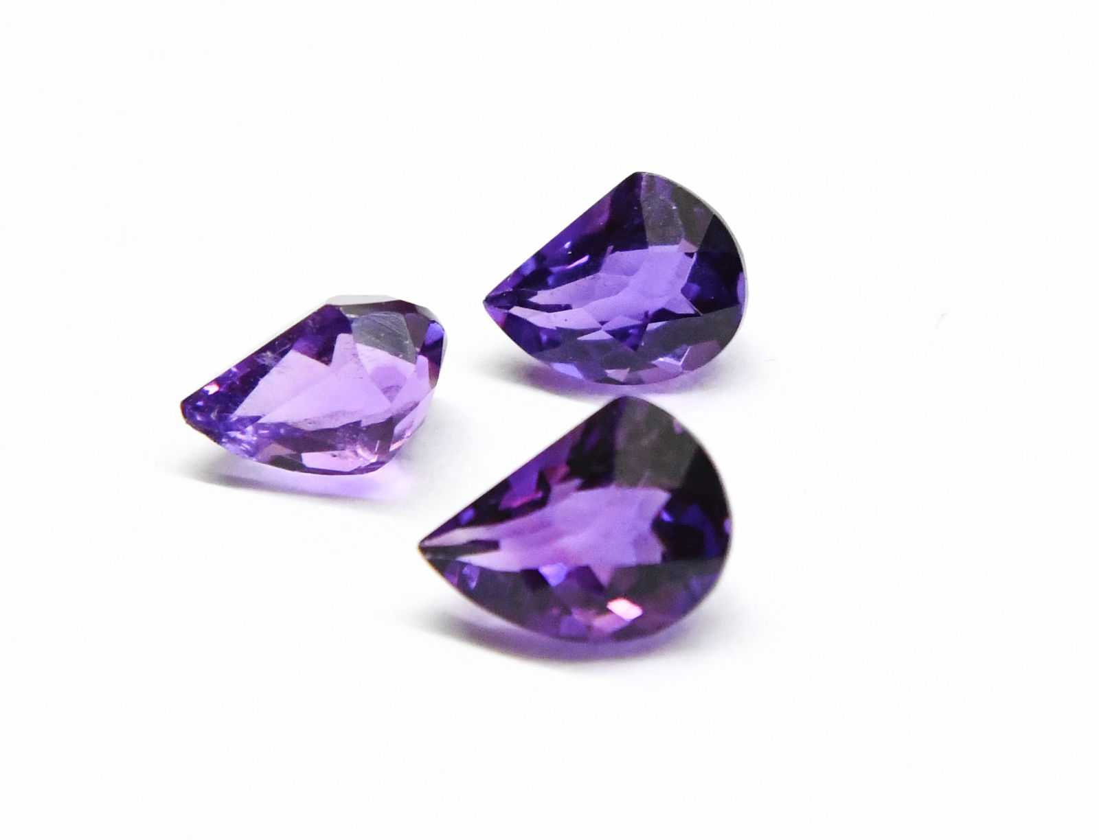 NATURAL AMETHYST CARVED CUTSTONE 8X11 -8X12 MM 3 PC (1 of 2)