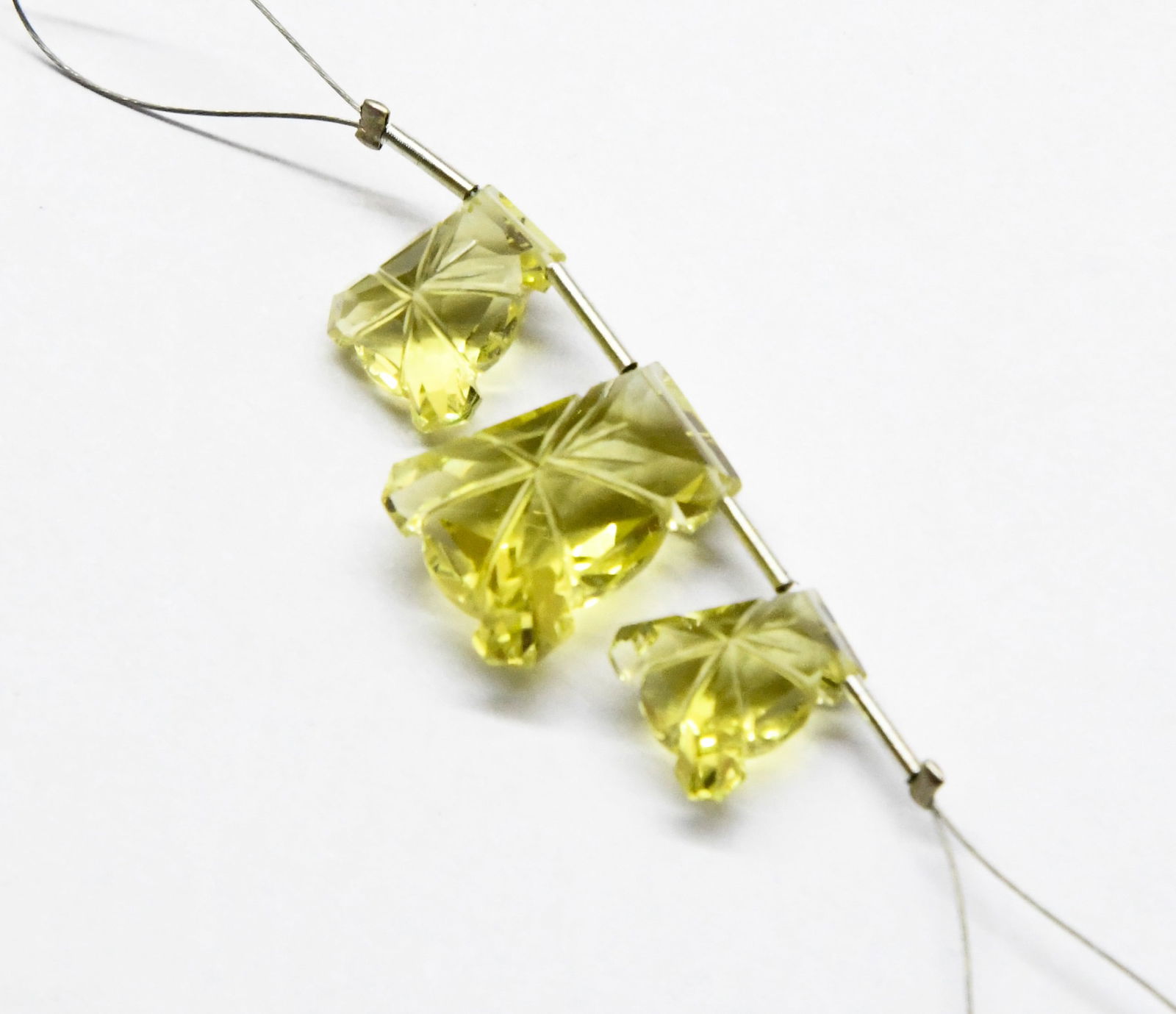 NATURAL LEMON QUARTZ CARVED FANCY 9X10 - 12X15 MM 3 PC: These are natural, earth mined and hand crafted with precision. Stone: Lemon Quartz, Stone Shape: Carved Fancy, Stone Size: 9.5x10 - 12x15 mm, Width: 6.5 - 9 mm, Weight: approx. 16.50 carats. The phot