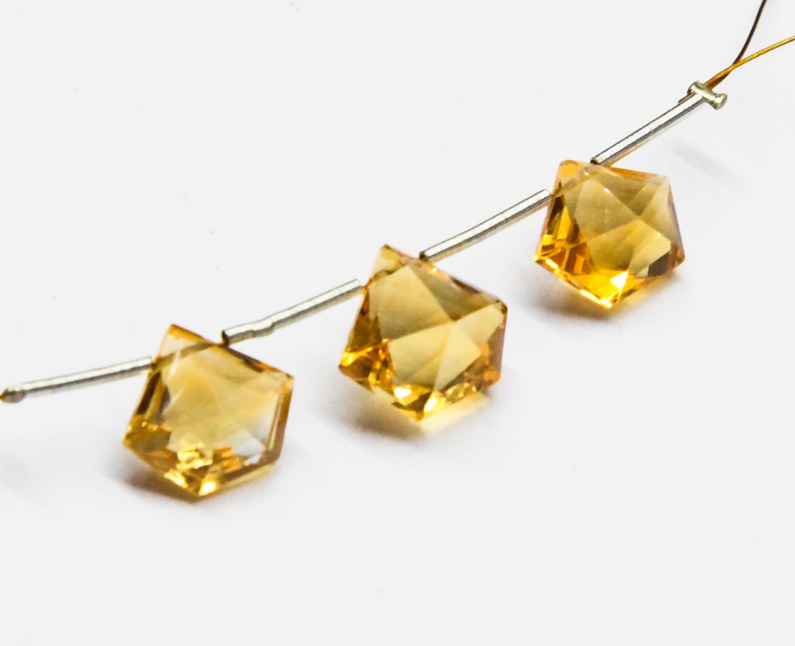 NATURAL CITRINE BEADS FACETED FANCY 9X11 - 10X11 MM 3 PC: These are natural, earth mined and hand crafted with precision. Stone: Citrine, Stone Shape: Faceted Fancy, Stone Size: 9x11 - 10.5x11.5 mm, Width: 6 - 8 mm, Weight: approx. 10.20 carats. The photogra