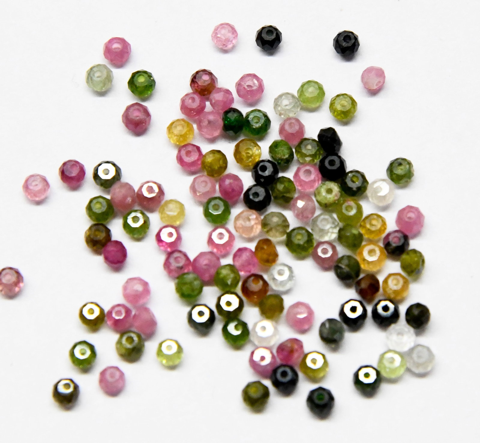 (100 PIECES) NATURAL MULTI TOURMALINE BEADS FACETED ROUND 3MM: These are natural, earth mined and hand crafted with precision. Stone: Multi Tourmaline, Stone Shape: Faceted Round, Stone Size: 3 mm, Weight: approx. 14 carats. The photographs are enlarged to show t