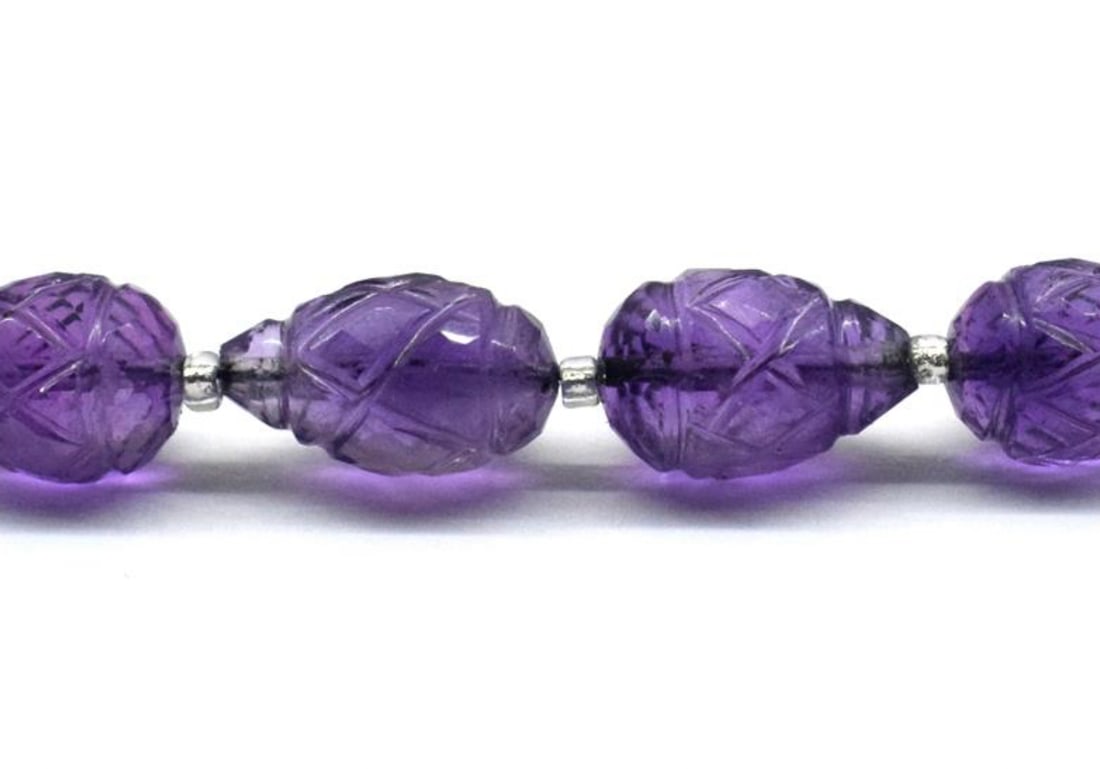 NATURAL AMETHYST BEADS FACETED CARVED BRIOLETTE 6.5X9 - 6.5X11 MM 6 PCS: These are natural, earth mined and hand crafted with precision. Stone: Amethyst, Stone Shape: Carved Briolette, Stone Size: 6.5x9 - 6.5x11mm, Weight: approx. 15.50 carats. The photographs are