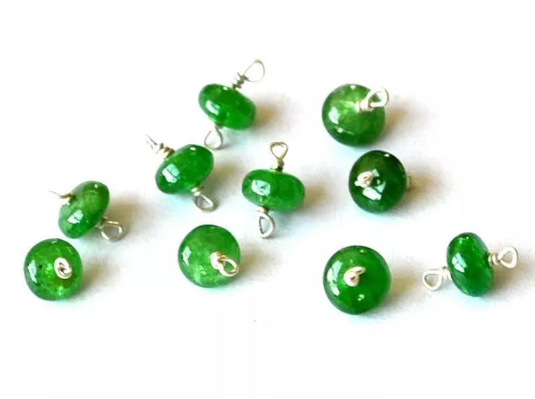 NATURAL TSAVORITE BEADS RONDELLE 4.5 - 5 MM SOLID 925 SILVER 10 PCS: These are natural, earth mined and hand crafted with precision. Stone: Tsavorite, Stone Shape: Rondelle, Stone Size: 4.5 - 5 mm, Width - 2.5 - 3 mm, Weight: approx. 8.5 carats. The photographs are enl