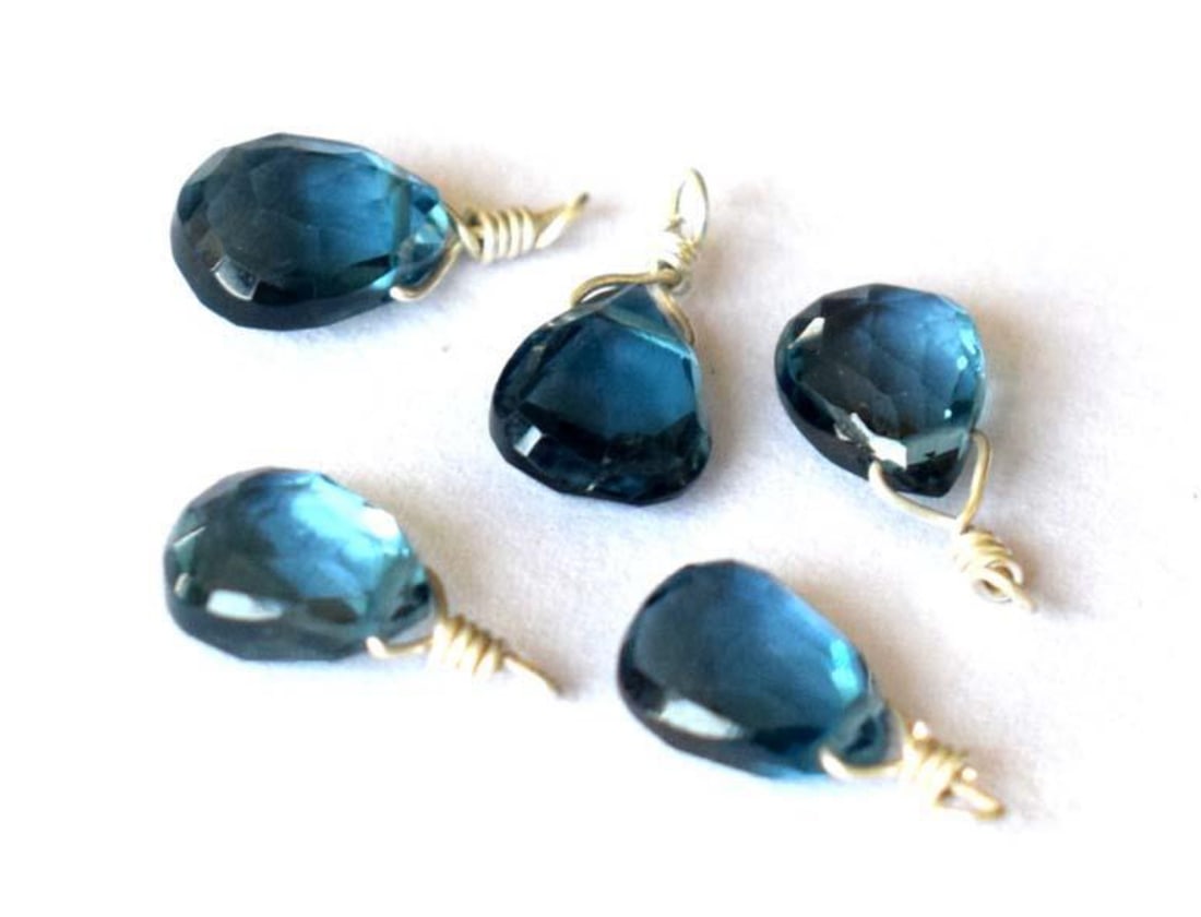 LONDON BLUE TOPAZ BEADS FACETED PEAR 5.5X7 MM SOLID 925 SILVER 5 PCS: These are natural, earth mined and hand crafted with precision. Stone: London Blue Topaz, Stone Shape: Faceted Pear, Stone Size: 5.5x7 - 5.5x7.5 mm, Width: 3 - 3.5 mm, Weight: approx. 7 carats. The ph