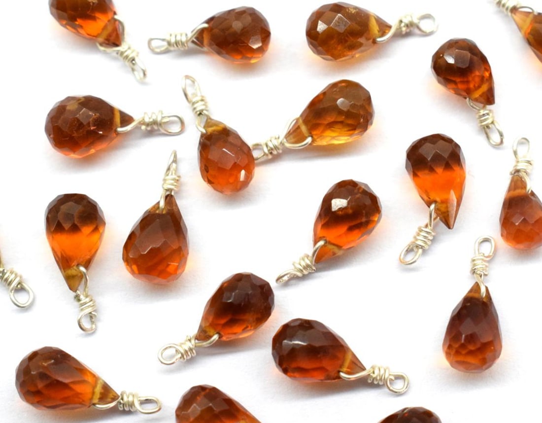 GOLDEN CITRINE BEADS FACETED BRIOLETTE 4X6 - 4X7MM SOLID 925 SILVER 20PCS: These are natural, earth mined and hand crafted with precision. Stone: Golden Citrine, Stone Shape: Faceted Briolette, Stone Size: 4x6 - 4x7 mm, Weight: approx. 18 carats. The photographs are enlarged