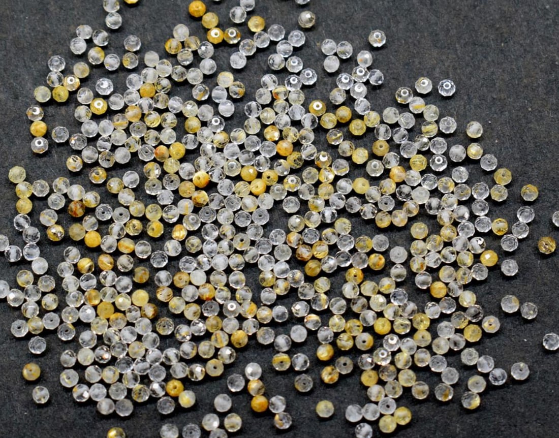 (500 PIECES) NATURAL GOLDEN RUTILE BEADS FACETED ROUND 2.5 MM: These are natural, earth mined and hand crafted with precision. Stone: Golden Rutile, Stone Shape: Faceted Round, Stone Size: 2.5 mm, Weight: approx. 39 carats. The photographs are enlarged to show th
