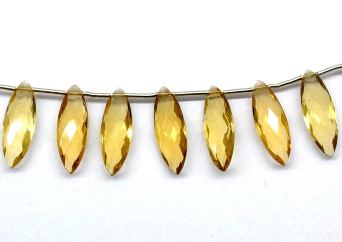 NATURAL CHAMPAGNE QUARTZ BEADS FACETED MARQUISE 6X17.5 - 6X18 MM 7 PCS: These are natural, earth mined and hand crafted with precision. Stone: Champagne Quartz, Stone Shape: Faceted Marquise, Stone Size: 6x17.5 - 6x18 mm, Width: 3.5 - 4 mm, Weight: approx. 19 carats. The