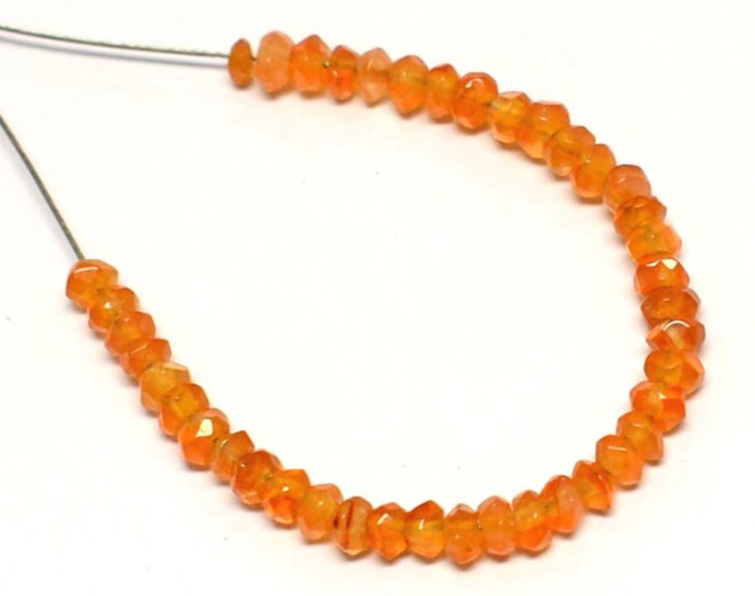 NATURAL CARNELIAN BEADS FACETED RONDELLE 2.5 - 3 MM 40 PCS (2 TASSELS): These are natural, earth mined and hand crafted with precision. Stone: Carnelian, Stone Shape: Faceted Rondelle, Stone Size: 3 mm, Width: 1.5 - 2 mm, Weight: approx. 4.50 carats. The photographs are e