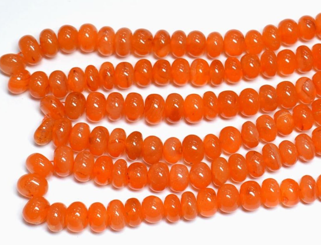 18" STRAND NATURAL CARNELIAN BEADS RONDELLE 6 - 9 MM 1 LINE: These are natural, earth mined and hand crafted with precision. Stone: Carnelian, Stone Shape: Rondelle, Stone Size: 6 - 9 mm, Width: 4 - 7 mm, Weight: approx. 212 carats. The photographs are enlarged