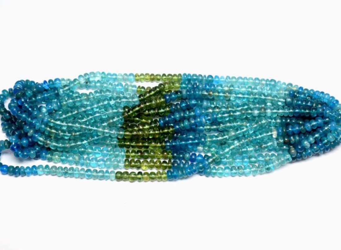 15.5" STRAND NATURAL MULTI APATITE BEADS RONDELLE 5 - 6 MM 1 LINE: These are natural, earth mined and hand crafted with precision. Stone: Multi Apatite, Stone Shape: Rondelle, Stone Size: 5 - 6 mm, Width: 2.5 - 4 mm, Weight: approx. 124 carats. The photographs are en