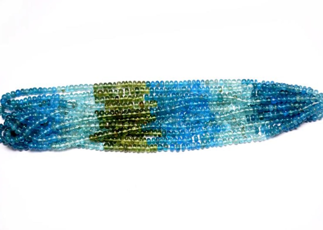 15.5" STRAND NATURAL MULTI APATITE BEADS RONDELLE 4 - 5 MM 1 LINE: These are natural, earth mined and hand crafted with precision. Stone: Apatite, Stone Shape: Rondelle, Stone Size: 4 - 5 mm, Width: 2 - 3.5 mm, Weight: approx. 80 carats. The photographs are enlarged