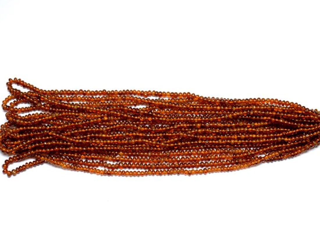 15.5" STRAND NATURAL HESSONITE GARNET BEADS RONDELLE 3 - 4 MM 1 LINE: These are natural, earth mined and hand crafted with precision. Stone: Hessonite Garnet, Stone Shape: Rondelle, Stone Size: 3 - 4 mm, Width: 2 - 3 mm, Weight: approx. 53 carats. The photographs are en