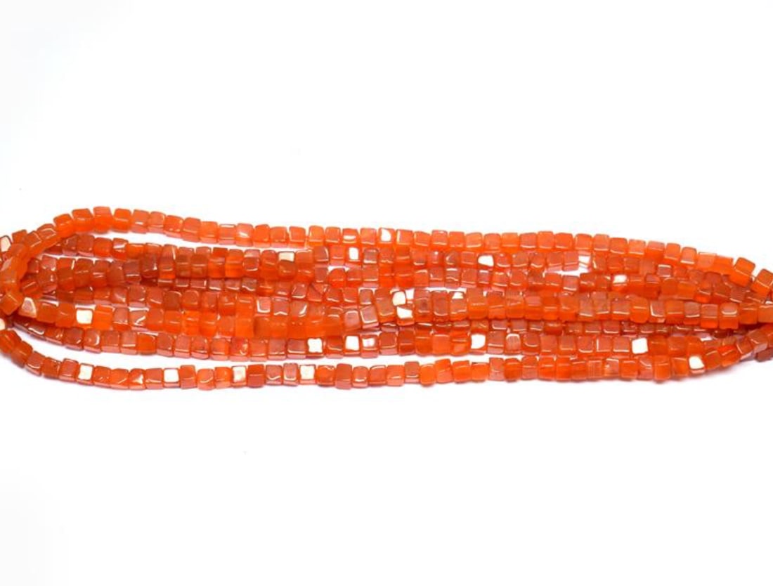 16" STRAND NATURAL CARNELIAN BEADS BOX 4.5 - 5 MM 1 LINE: These are natural, earth mined and hand crafted with precision. Stone: Carnelian, Stone Shape: Box, Stone Size: 4,5 - 5 mm, Weight: approx. 101 carats. The photographs are enlarged to show the clarity