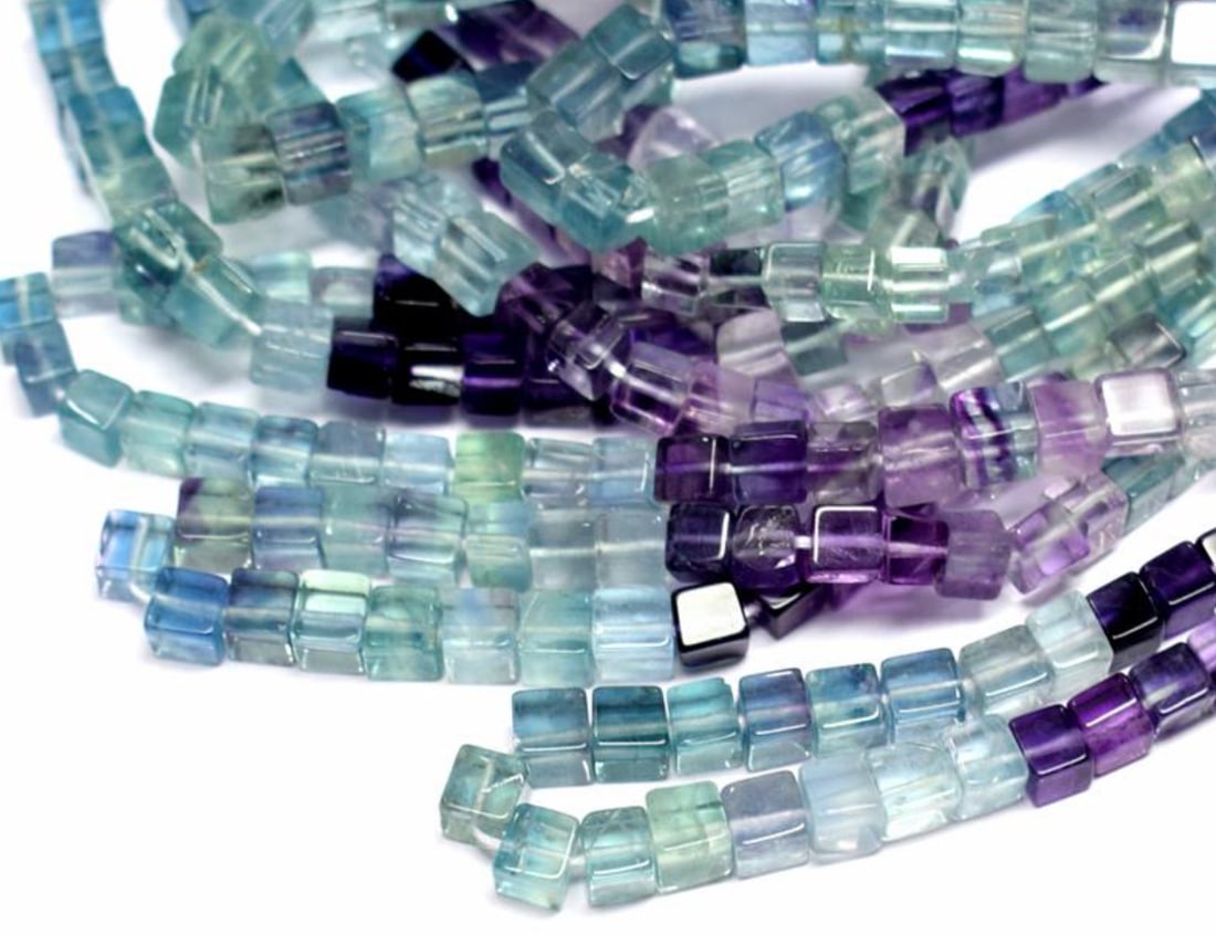 16" STRAND NATURAL MULTI FLUORITE BEADS BOX 3.5 - 5 MM 1 LINE: These are natural, earth mined and hand crafted with precision. Stone: Multi Fluorite, Stone Shape: Box, Stone Size: 3.5 - 5 mm, Weight: approx. 112 carats. The photographs are enlarged to show the cl