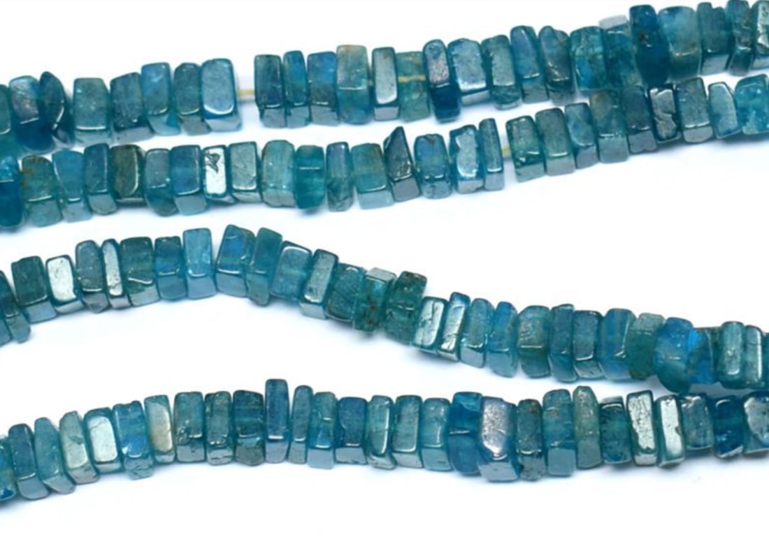16" STRAND NATURAL NEON APATITE BEADS FLAT SQUARE 4.5 - 7 MM 1 LINE: These are natural, earth mined and hand crafted with precision. Stone: Neon Apatite, Stone Shape: Flat Square, Stone Size: 4,5 - 7 mm, Width: 1.5 - 3 mm, Weight: approx. 190 carats. The photographs ar