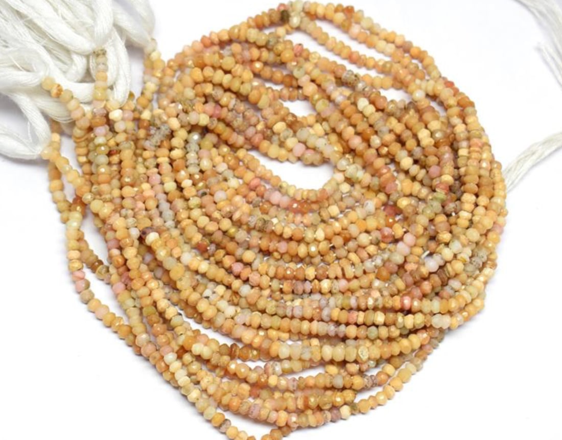 12.5" STRAND NATURAL PINK OPAL BEADS FACETED RONDELLE 3 MM 1 LINE: These are natural, earth mined and hand crafted with precision. Stone: Pink Opal, Stone Shape: Faceted Rondelle, Stone Size: 3 mm, Width: 1.5 - 2.5 mm, Weight: approx. 19 carats. The photographs are e