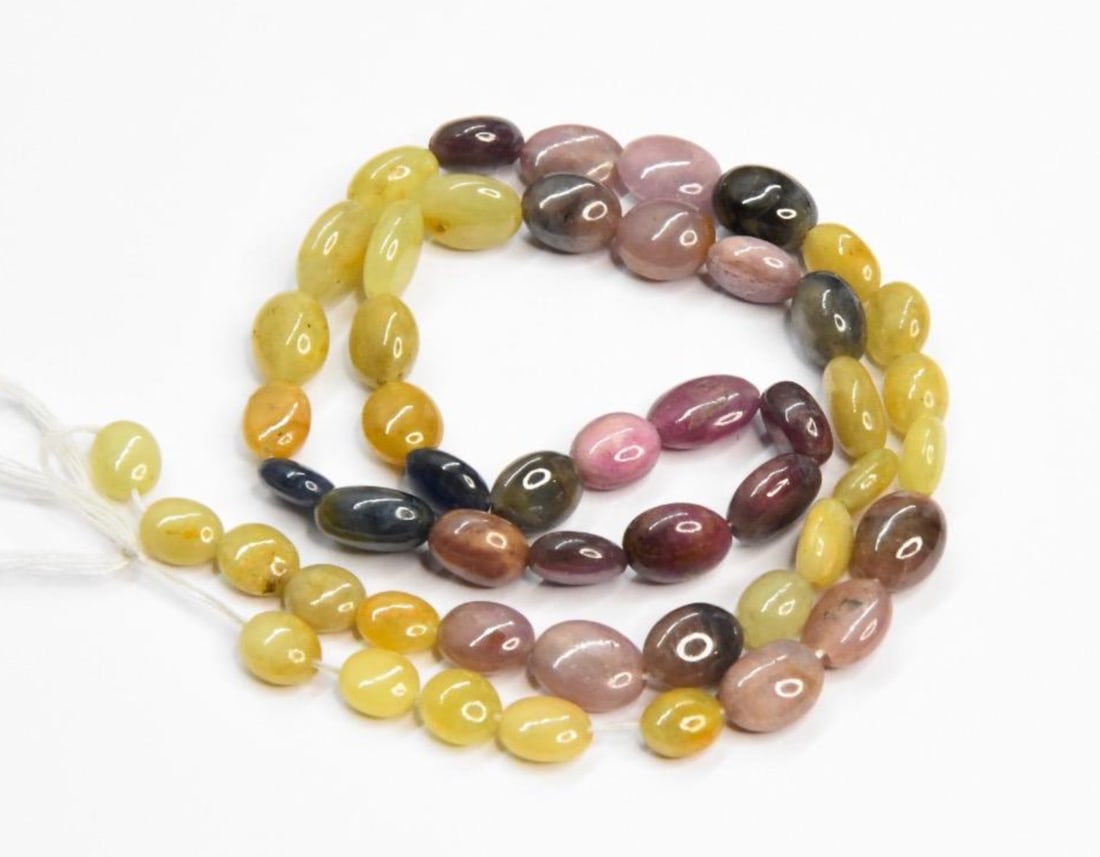NATURAL MULTI SAPPHIRE BEADS OVAL 5.5X7 - 7.5X10 MM, 16'' STRAND (1 of 2)